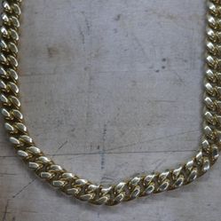 1OKT YELLOW GOLD CHAIN CURBLINK 59 GRAMS 22 INCHES LONG 11.2MM WIDE 877481-1 