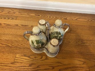 Oil vinegar, salt, and pepper dispenser