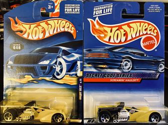 Hot Wheels Screamin’ Hauler 2 pack in two different cards. Picture one is collector 048 4/4 and picture 2’s card reads secret code series SH. 2 pack