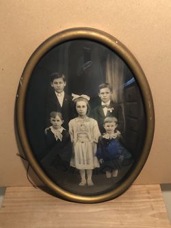 Framed photo of children.