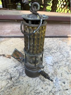 Antique safety lamps from the Wolf Safety Lamp Company of America.