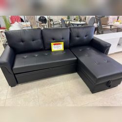 83.5"W  Vegan Leather Modern Reversible Sleeper Sectional Sofa with Storage Chaise Black and  Gray color