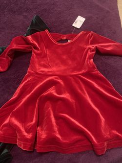 Kids dresses size 12-18 for red dress and 4t for green dress really cute