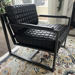 One black/gray metal and leather accent chair, removable cushions and covers 