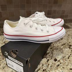 Brand new white Converse low tops