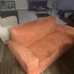 Small orange couch 