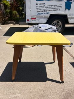 Yellow Side Table with Rolling Legs