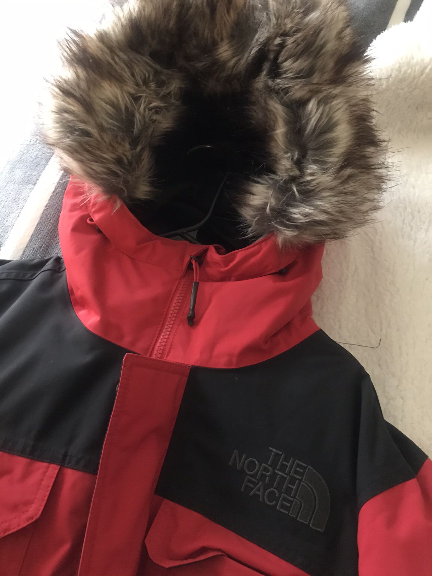 The north face coat, men’s small, red/black