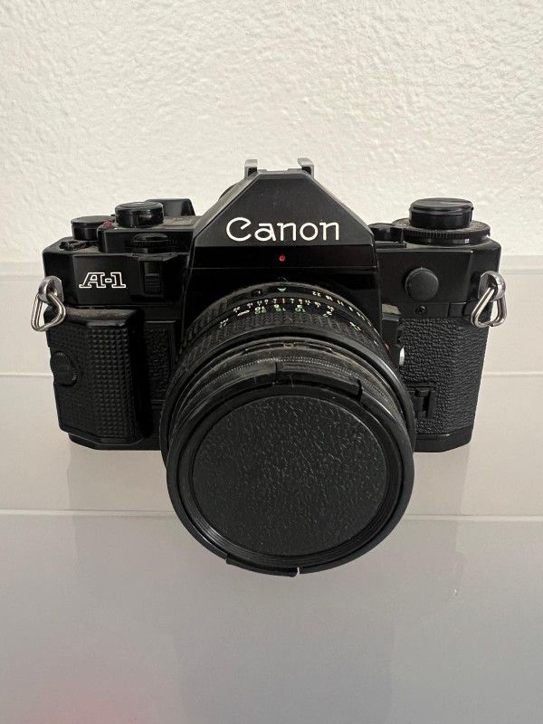 Canon A-1 Film Camera With 55mm Lens, New Condition!