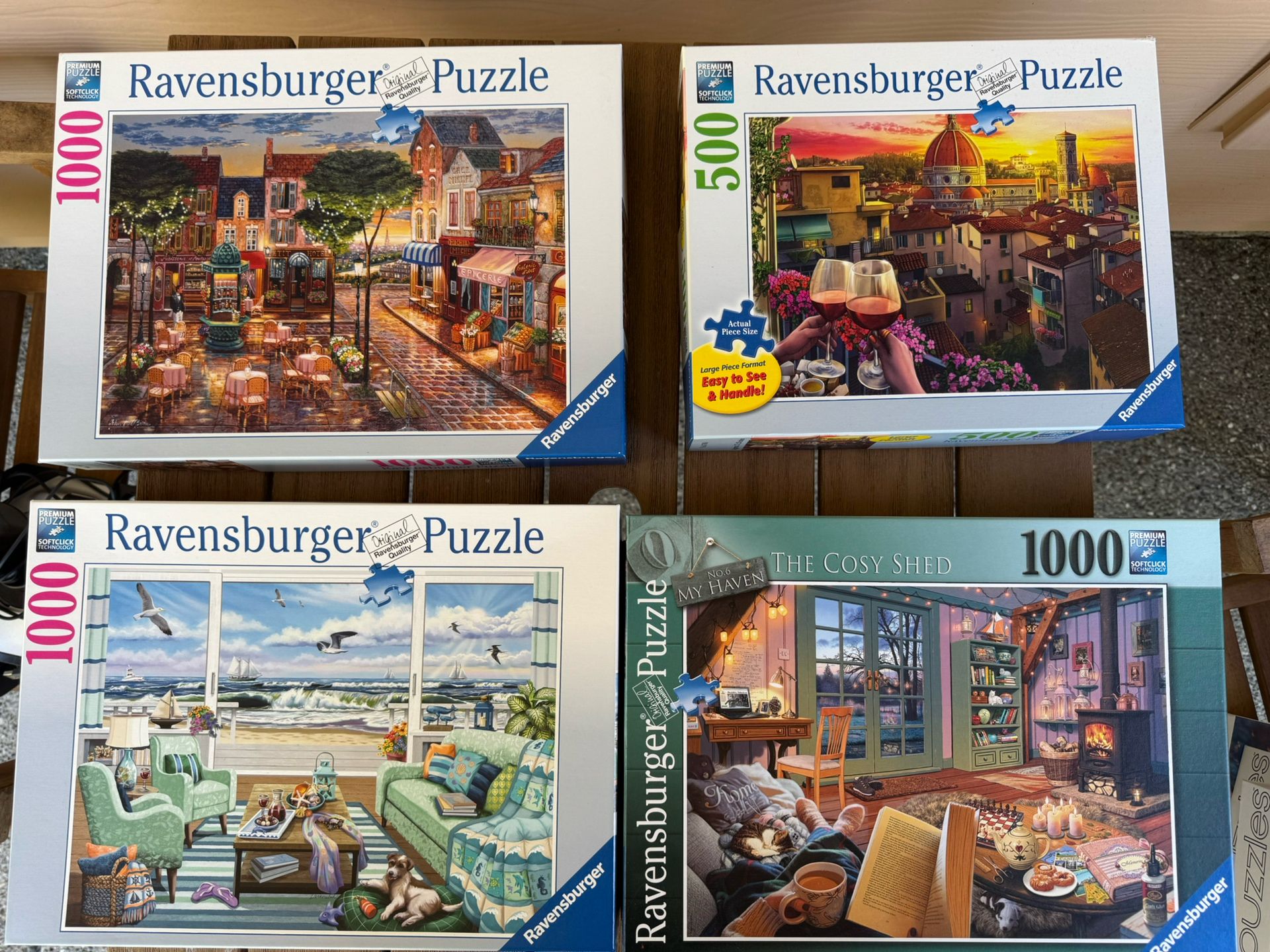 Four Ravensburger Puzzles