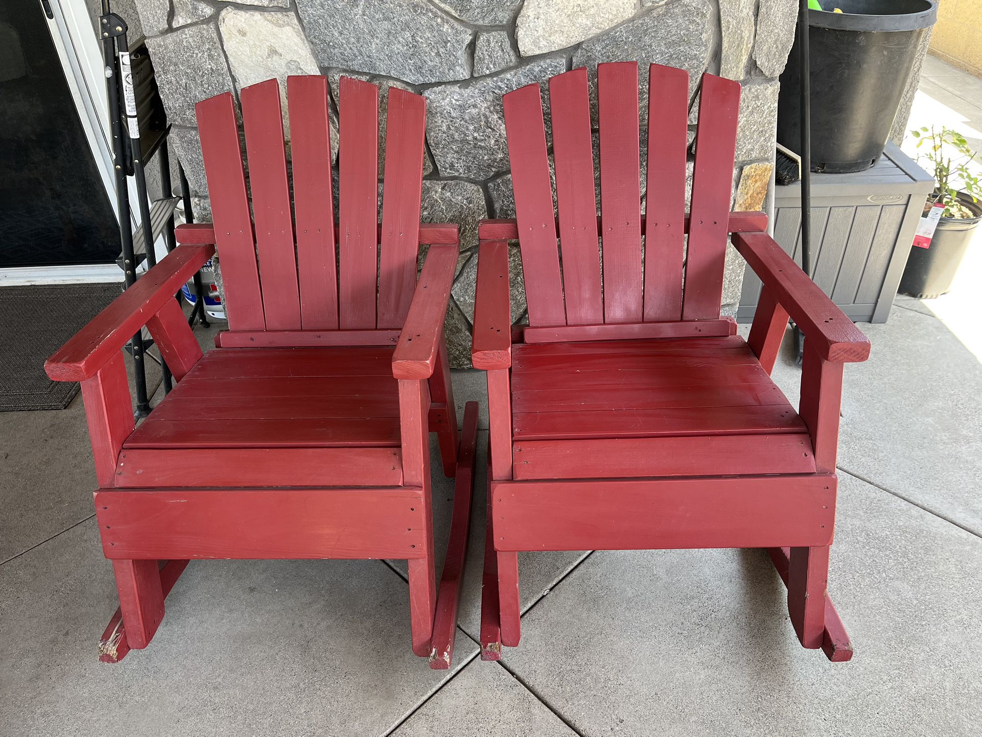 Red Wooden Rocking Chairs