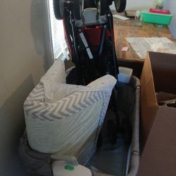 A stroller andp Play. Ben
