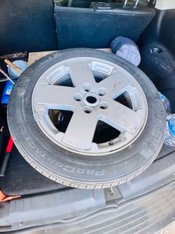 225 55 r18 continental tire with rim used