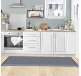 shows a KitchenClouds anti-fatigue comfort mat plastic wrapping