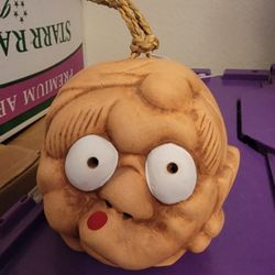 Goofy Face Clay Bell