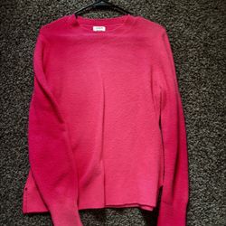 very soft bright pink sweater 
