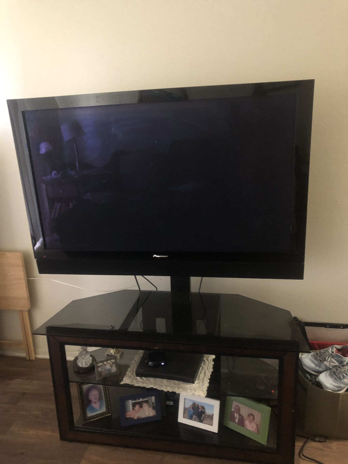 Pioneer tv with glass tv stand