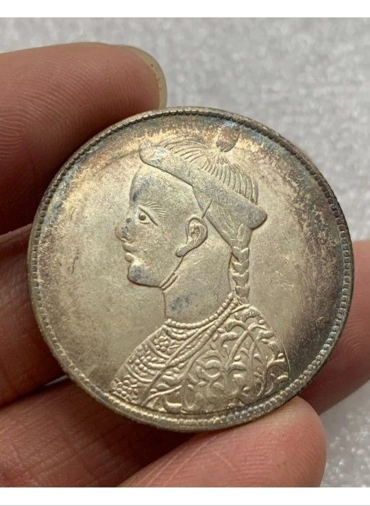1898**Rare: High Grade Uncirculated ** Queens Dynasty China Qing Dy "Guang Xu" Emperor Chuan Coin **100% Silver AA.** 32× 2 mm ** Weight 13 grams.