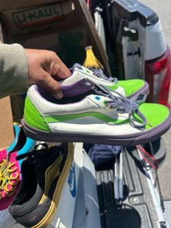 Size Vans Old Skool Toy Story Buzz Lightyear sneakers, featuring a design inspired by the character's signature white, green, and purple space ranger 