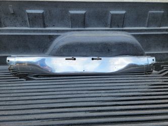 1955 CHEVY STATION WAGON REAR BUMPER CENTERPIEC