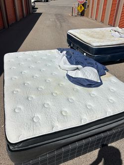 2 beds - king and queen and box springs
