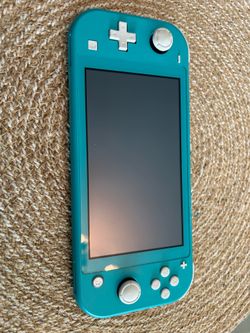 Nintendo Switch Lite (Teal) with charger. Fully functional, factory reset, ready to play. $100 OBO.