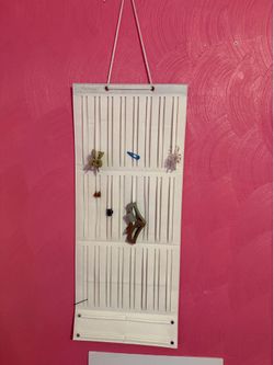 Hanging barrette and clip holder