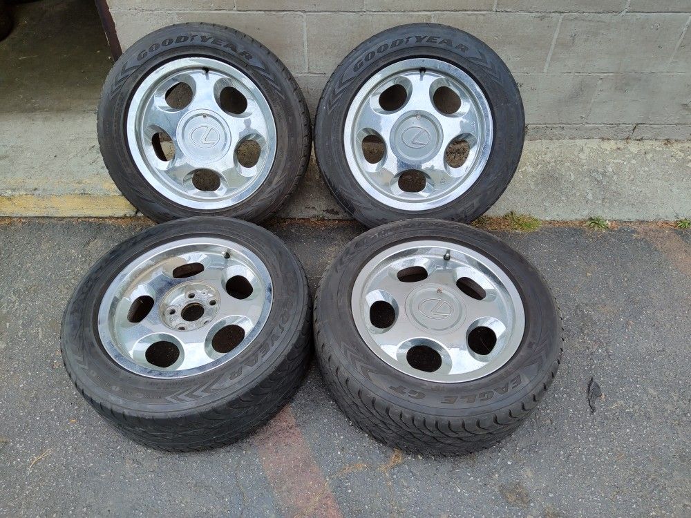MHT Chrome 16 inch wheels and old tires from a lexus. Fits toyota