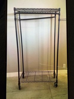 4 clothing racks $100