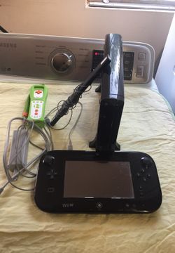 Wii U with one controller comes with smash bros and Mario cart