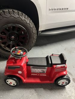 Fire Truck Ride On Truck W Sounds And Lights Comes W Charger In Great Condition 