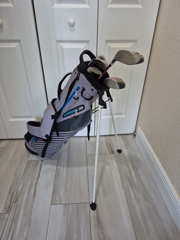 Junior Golf Clubs. 2, drivers, 2 Irons, One Putter