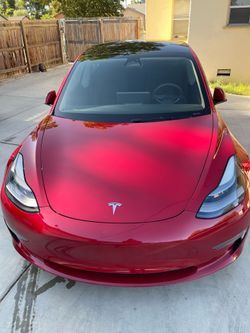 2023 Red Tesla Model 3 Rear Wheel Drive