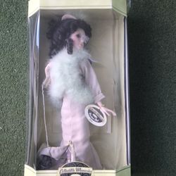 Beautiful vintage porcelain doll never open from my collection only $40