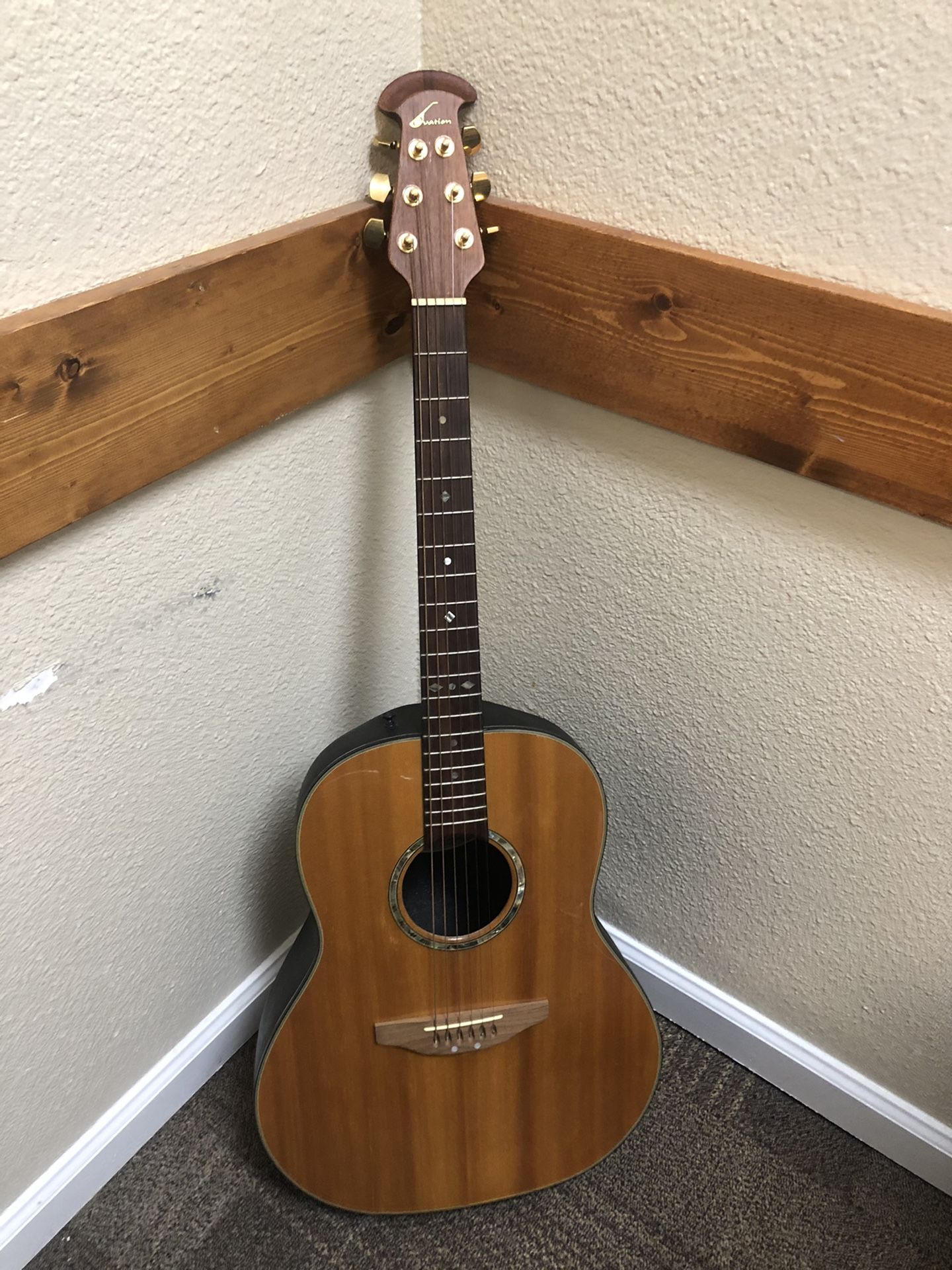 Beautiful Ovation Acoustic Guitar.