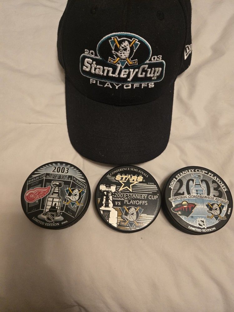 2003 Stanley Cup NHL Playoffs "Mighty Ducks" Hat & 3 Pucks
