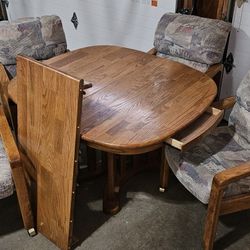 Solid Oak Table With Rolling Chairs
