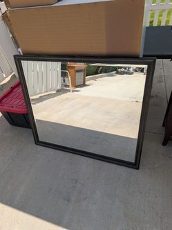 Hanging wall mirror