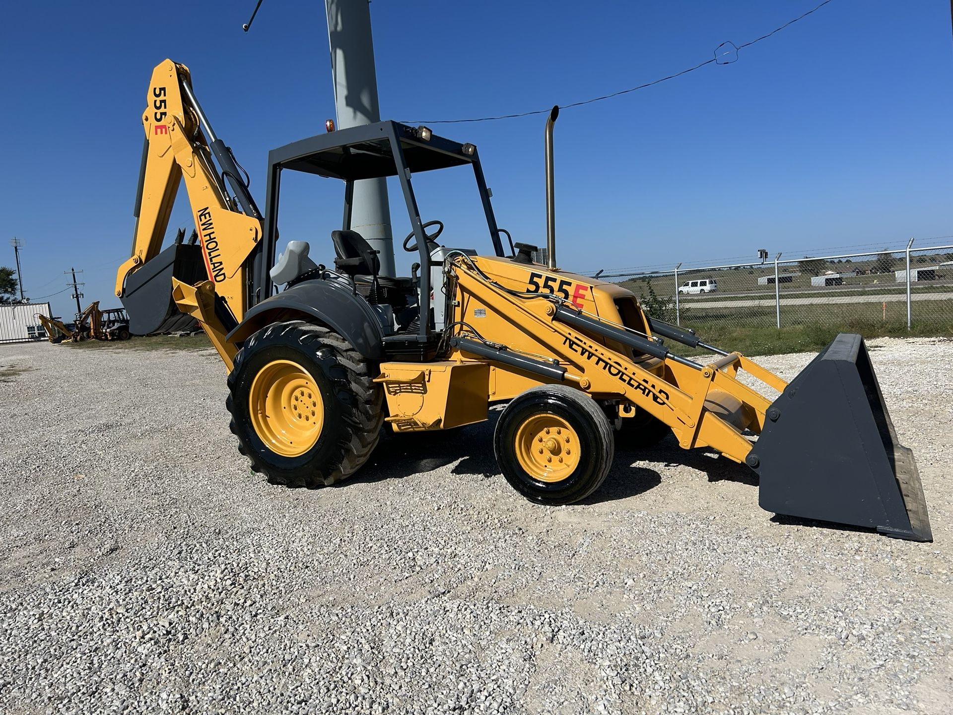 New Holland 555E Backhoe