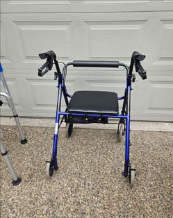 Walker with Seat and Storage.