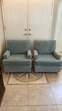 Two Accent chairs, feather and down filled cushions .