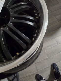 Black w/chrome deep dish 22" rims w/tires for sale