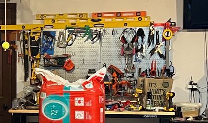 Assorted metal pegboards and cups/baskets