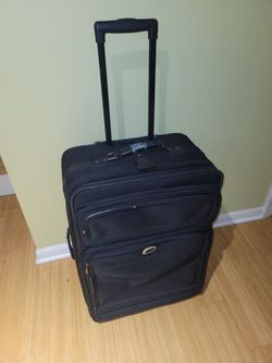 Suitcase On Wheels
