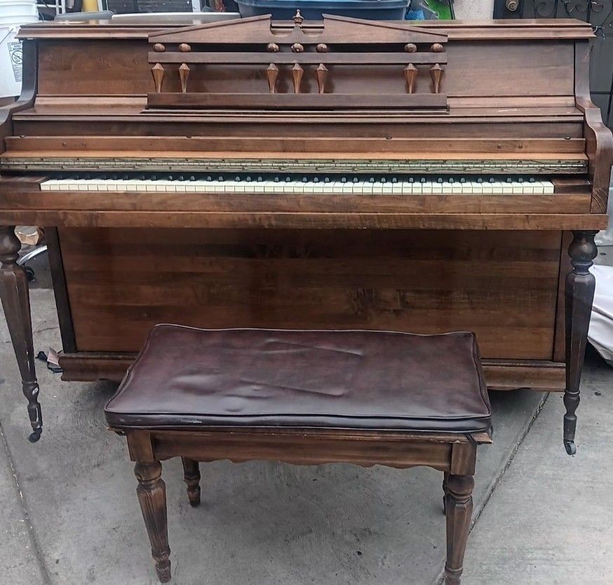 Piano with seat