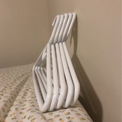 5 White Plastic Clothing Hangers