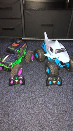 Grave digger and megalodon rc trucks