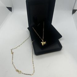 18k gold necklace and pendant