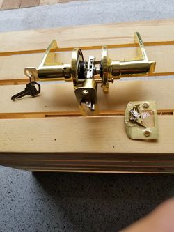 Defiant Polished Brass Keyed Entry Door Assembly, including jam plate and hardware, used for two days.