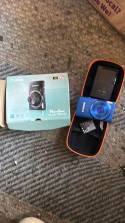 Canon camera with battery and charger